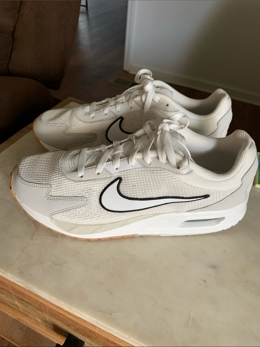 Nike White Sneakers with Black Swoosh and Gum Outsole